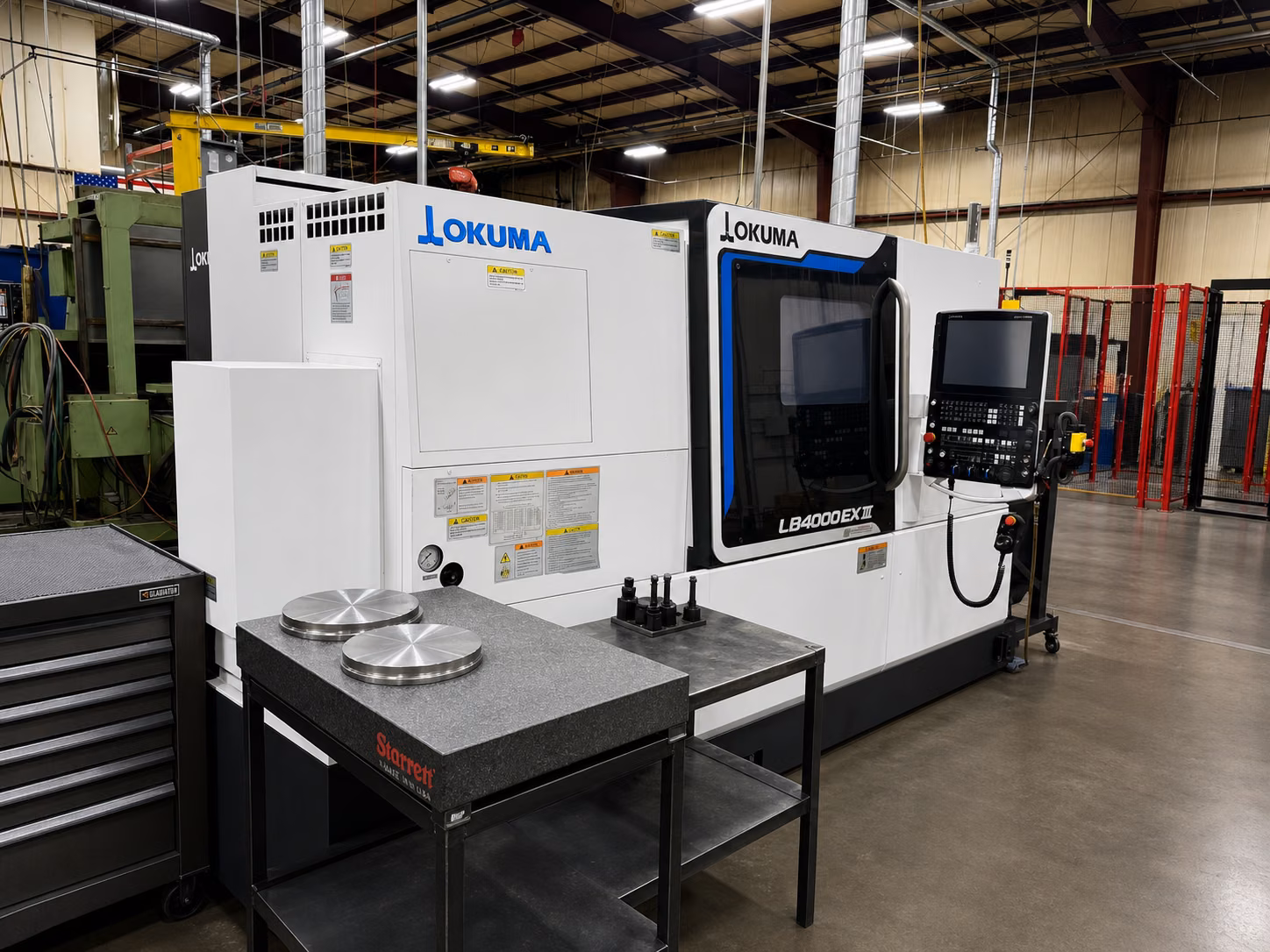 Organized Okuma LB4000 CNC turning cell